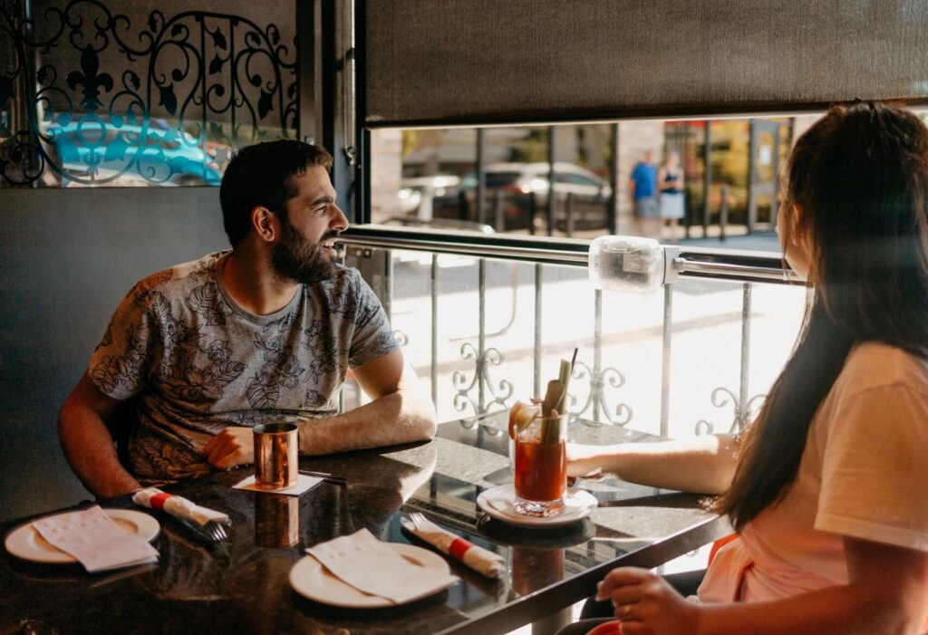 a man and woman at a restaurant