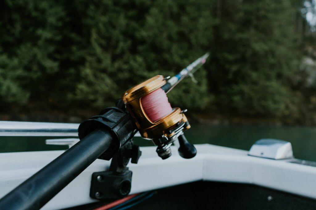 A fishing rod on a boat.