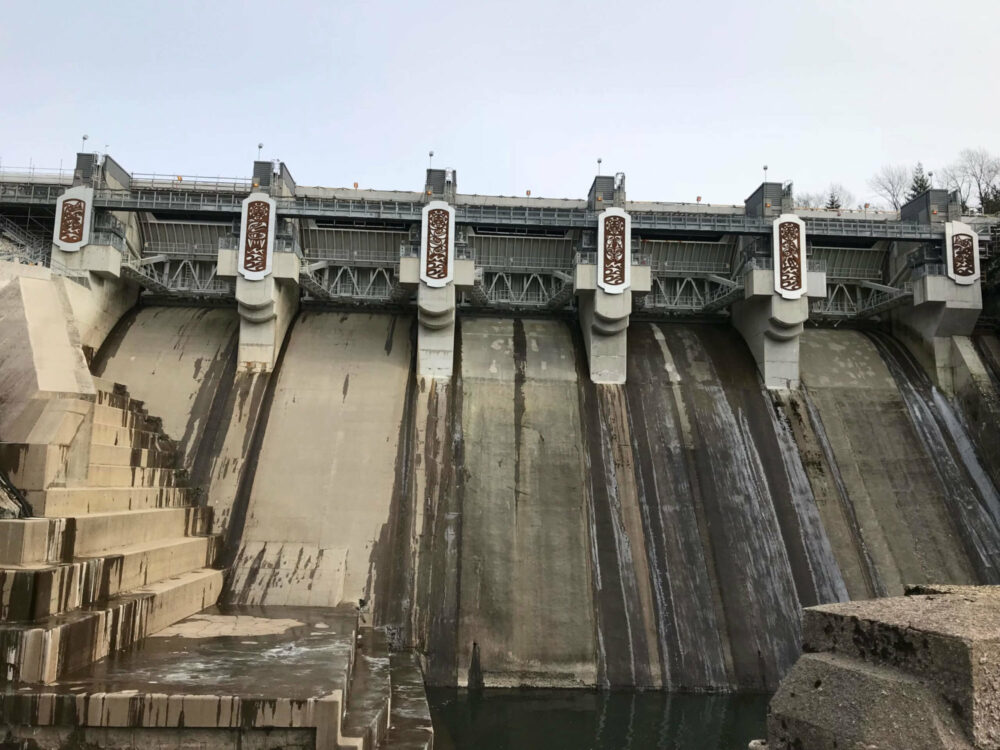 The Kwantlen Sculptures featured on the side of the Ruskin Dam.
