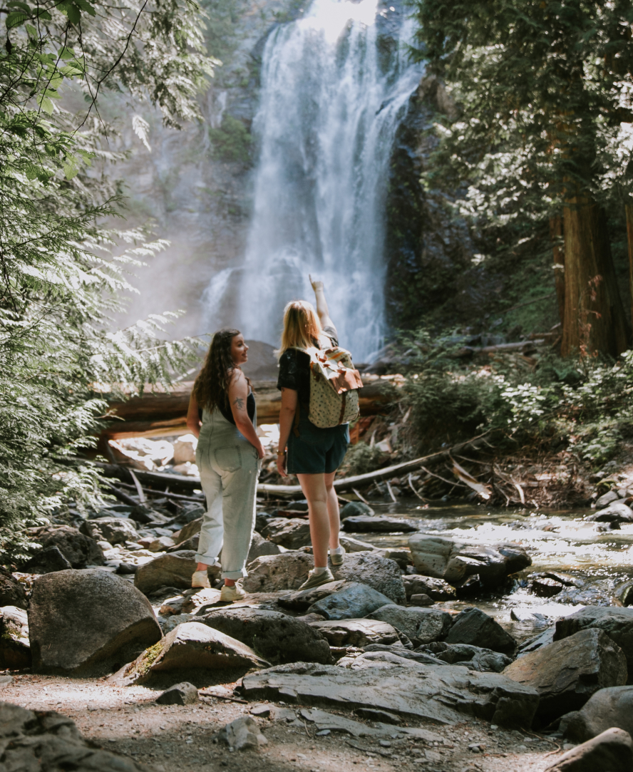 Fraser Valley Two Woman In Front Of A Waterfall