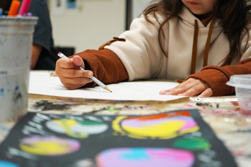 Child making art
