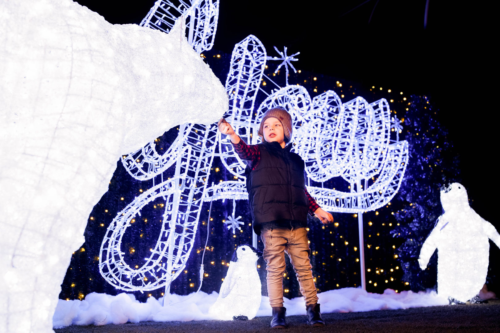 child with light display