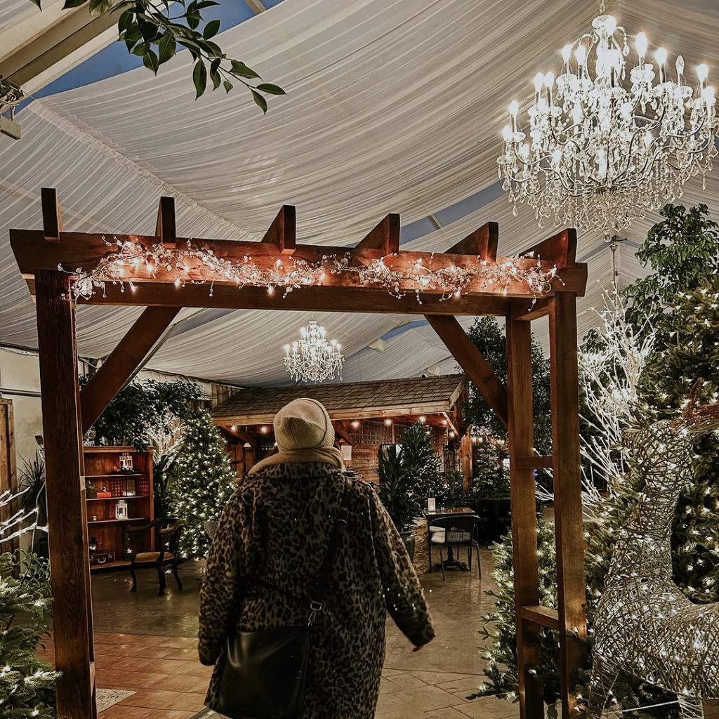 person walking into a holiday event