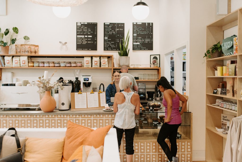 two customers order at a cafe