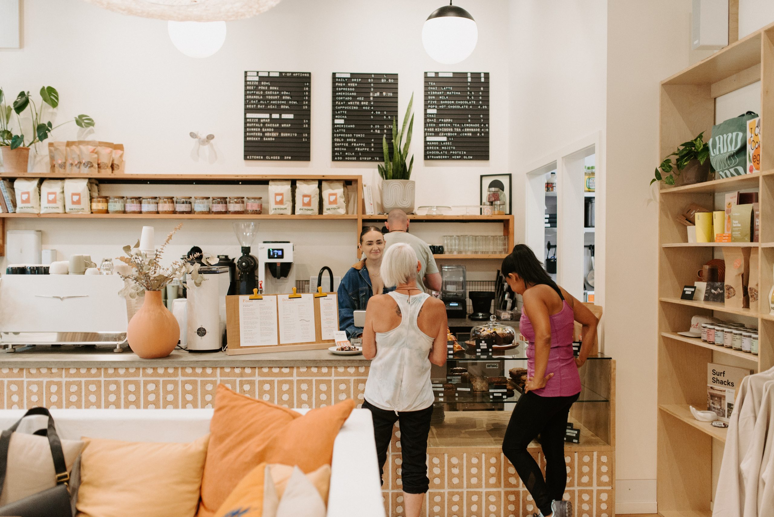 two customers order at a cafe
