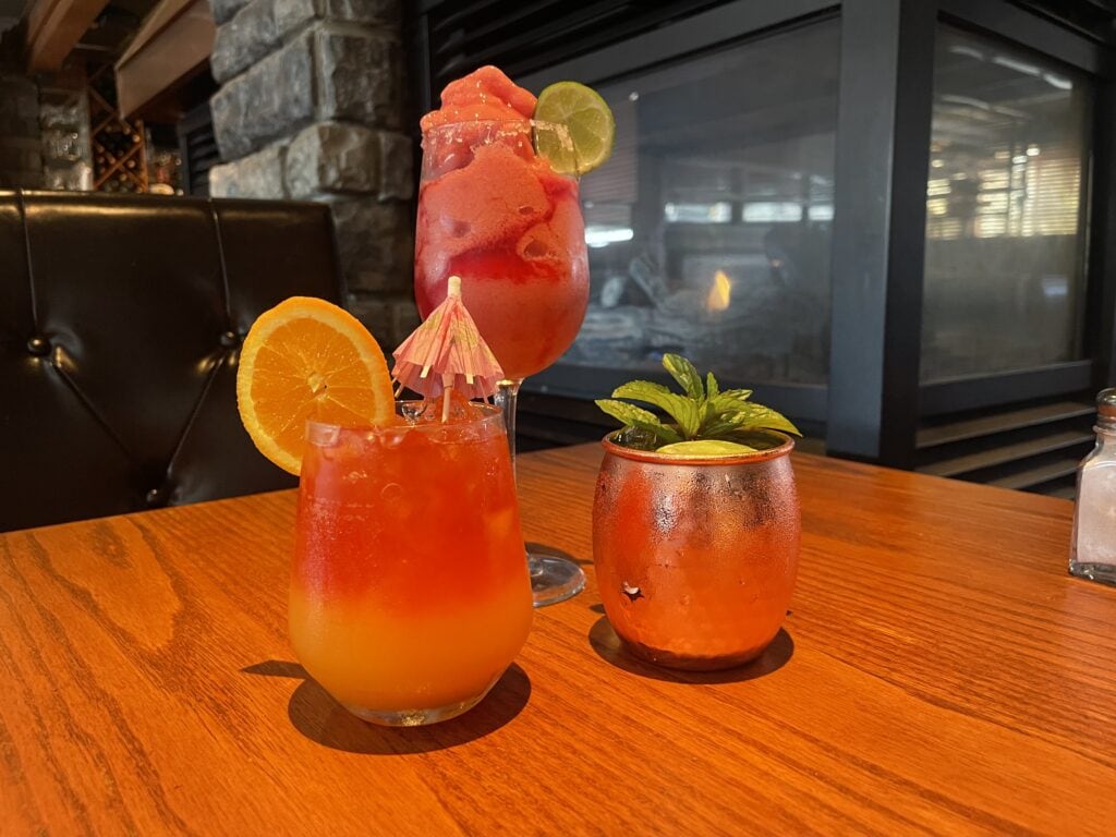 two cocktails on a table