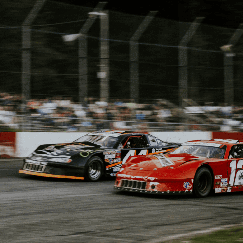 Two cars racing on a track.