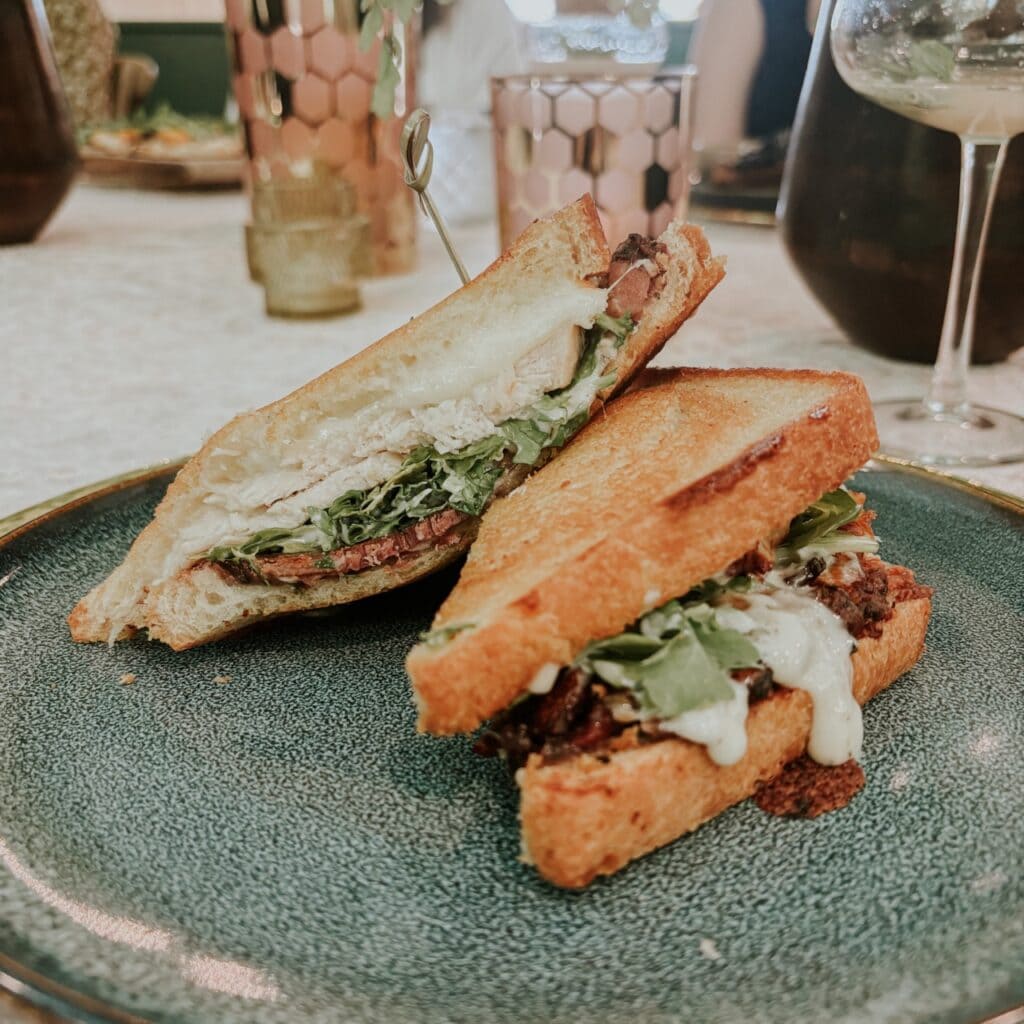 A sandwich on a blue plate