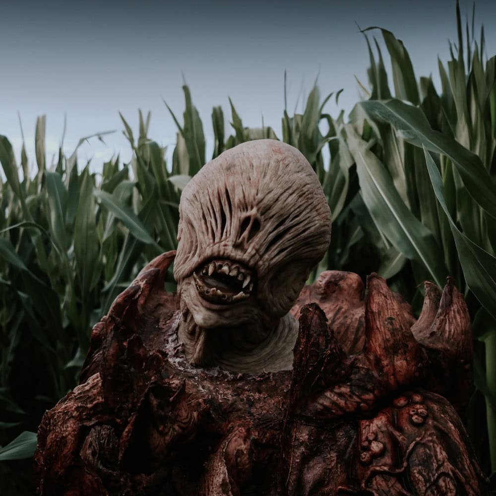 A Halloween monster in a corn maze at Maan Farms