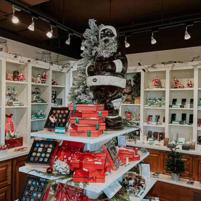 Chocolate Santa on top of the tiered chocolate display
