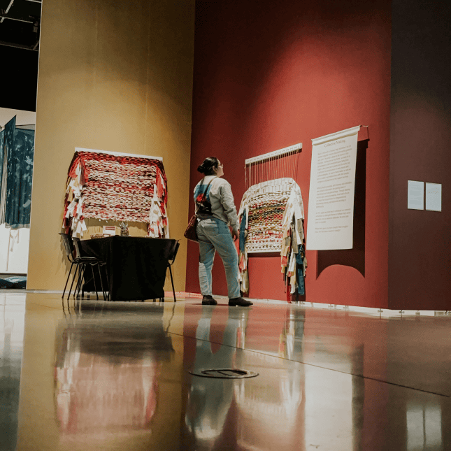 Woman admiring artwork