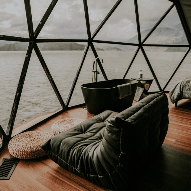 Indoor seating area looking onto Harrison Lake