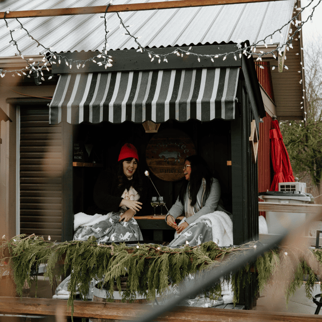 Woman sitting in an outside area 