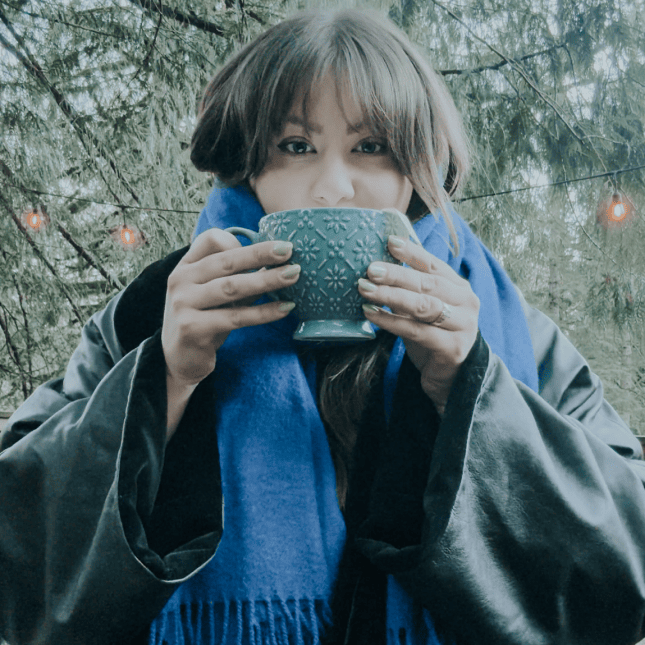 Woman sipping coffee