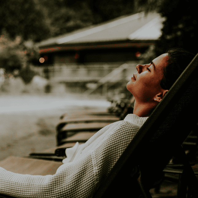 Woman laying on chair 