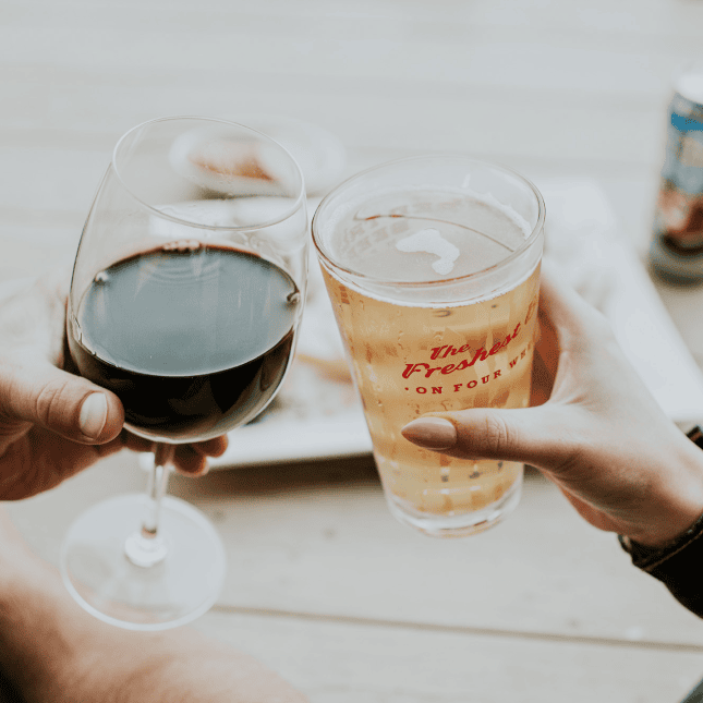 Picture of a beer and glass of wine 