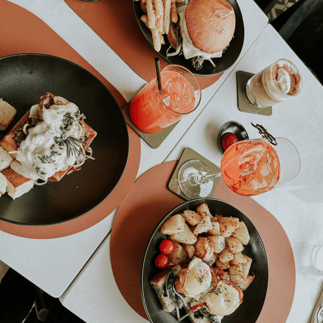 Table full of plates of food