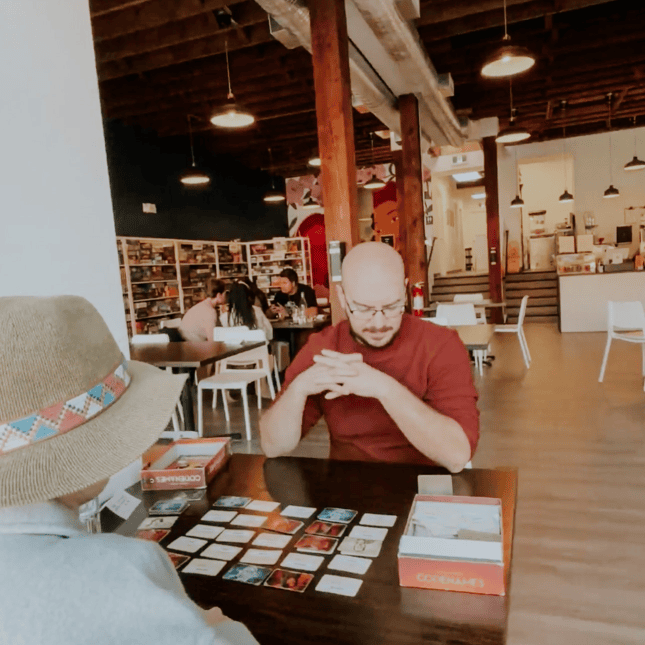 People playing board game 
