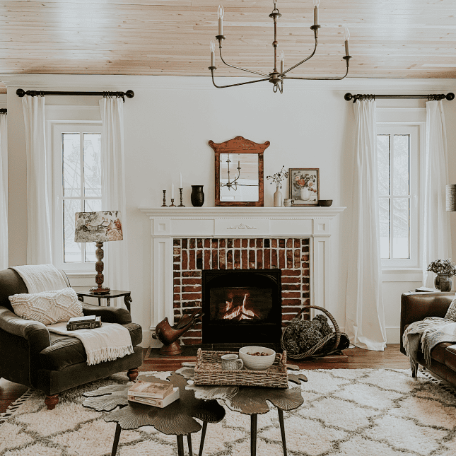 A room with a fireplace in the centre 