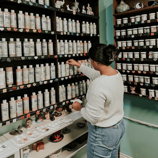 Person looking through paint options 