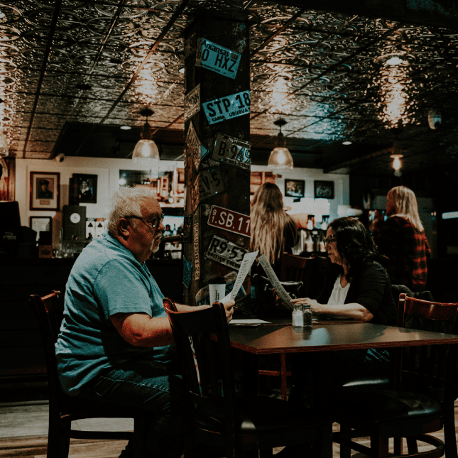 People sitting inside pub