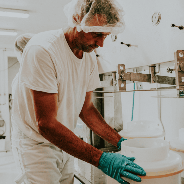 Person working inside a production space.