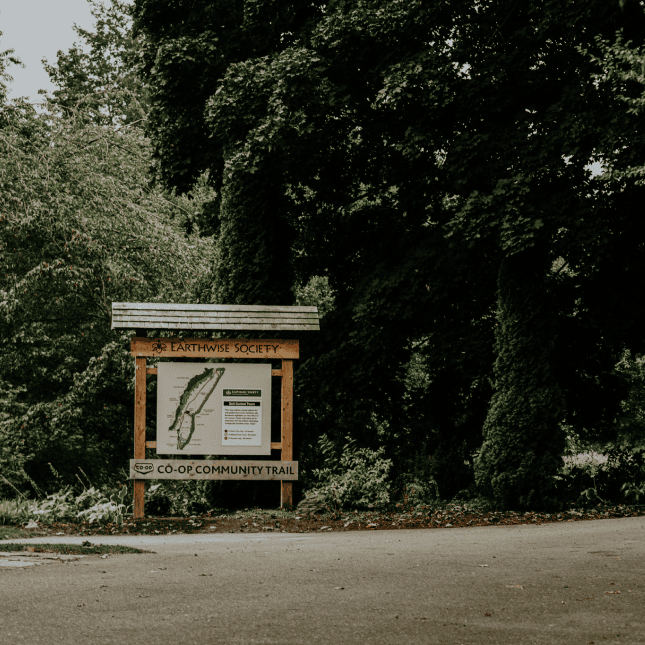 Sign outside a forested area
