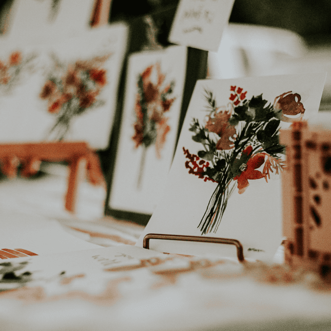 small flower paintings on display