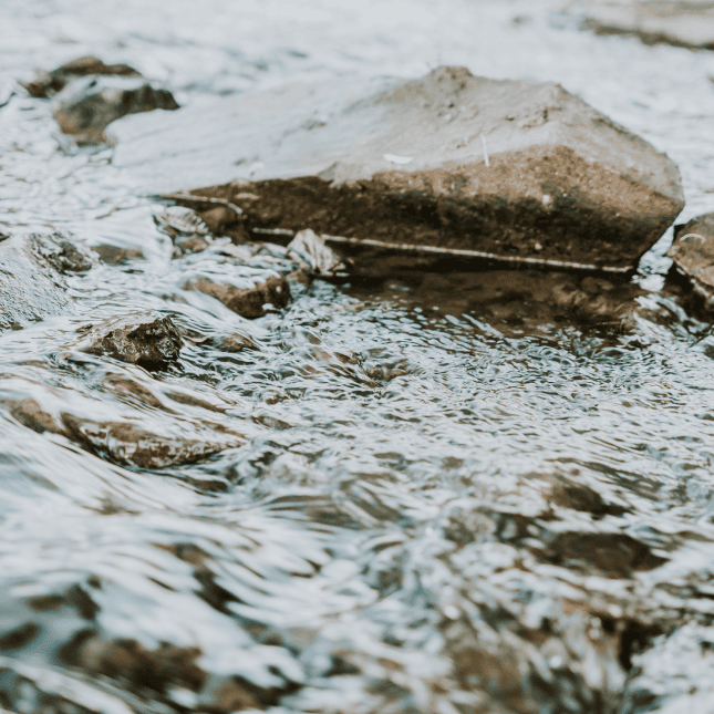 Small River Flows Over Stones 